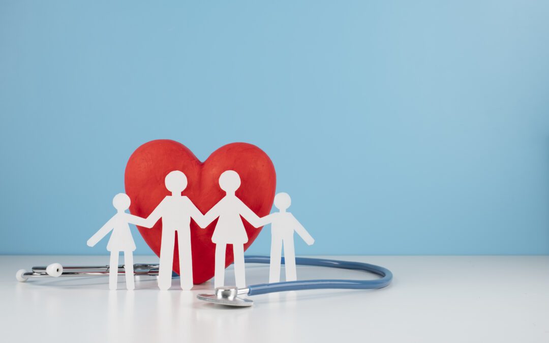 Health insurance concept with paper family.